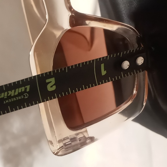 Wide frame lens sun glasses Translucent tan with a lens perfect for driving. - Picture 8 of 8